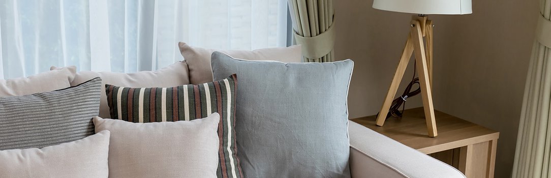 modern living room design with sofa and wooden lamp